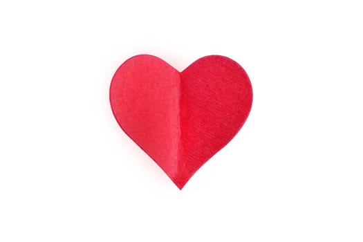 Red paper Valentines Day heart against a white background