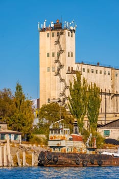 old abandoned soviet Port Balykchy on Issyk-Kul lake at sunny autumn afternoon.