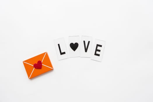 Love letter, small wooden orange envelope. Love lettering