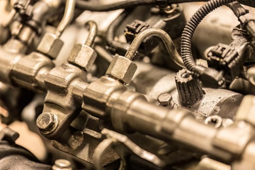 Rome, Italy 17 january 2024: Close-up photo of common rail diesel injectors, highlighting the intricate components of fuel injection.