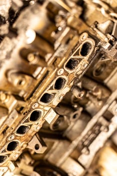 A photo showing dirty intake manifolds in a car engine, impacted by exhaust gas recirculation (EGR) effects.