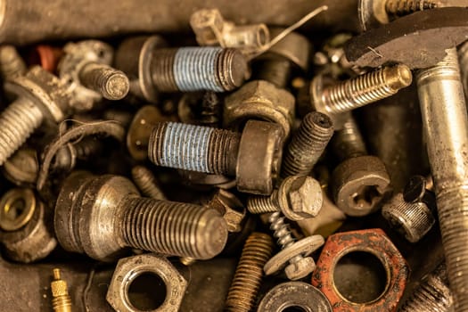 Photo highlighting old screws, symbolizing the enduring nature of mechanical repairs and maintenance.