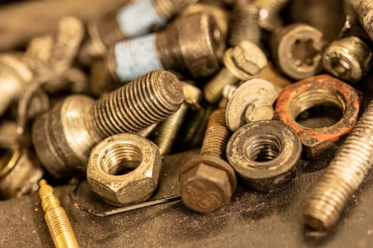 Photo highlighting old screws, symbolizing the enduring nature of mechanical repairs and maintenance.