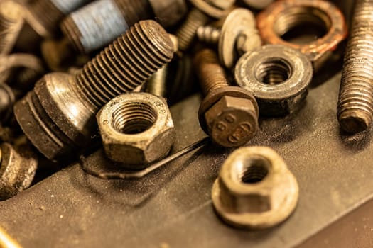 Photo highlighting old screws, symbolizing the enduring nature of mechanical repairs and maintenance.