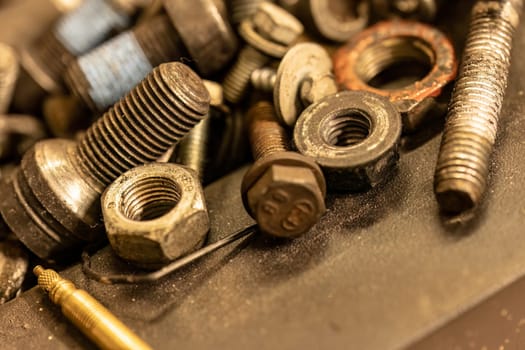 Photo highlighting old screws, symbolizing the enduring nature of mechanical repairs and maintenance.