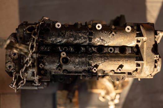 Rome, Italy 17 january 2024: Detailed photo of a corroded, dismantled car engine, highlighting the impact of wear and decay.