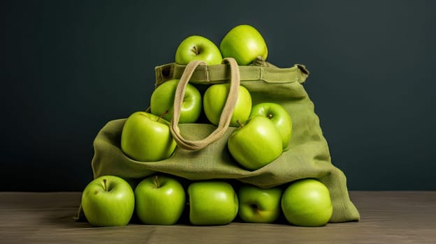 Bag made of natural fabric with green apples. The concept of recycling, saving, no plastic, proper nutrition, healthy lifestyle, diet, veganism, vegetarianism.