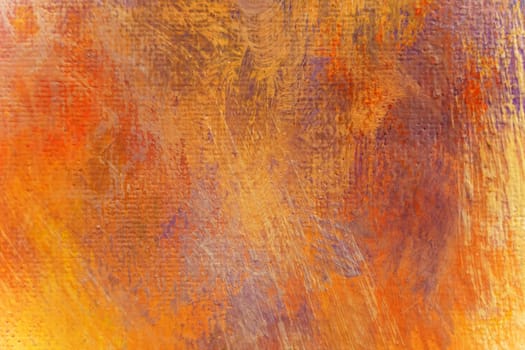 Bright texture of canvas painted in orange-yellow color with shades. Abstract background