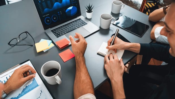 Group of diverse office worker employee working together on strategic business marketing planning in corporate office room. Positive teamwork in business workplace concept. Prudent