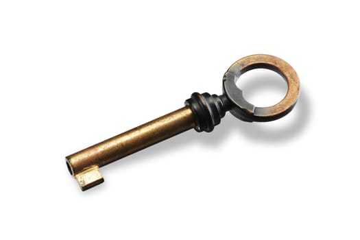 A brass key on white background with shadow