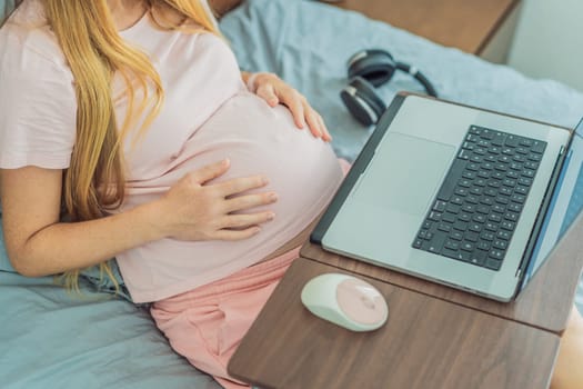 Pregnant woman working on laptop. Expectant woman efficiently works from home during pregnancy, blending professional commitment with maternal duties.