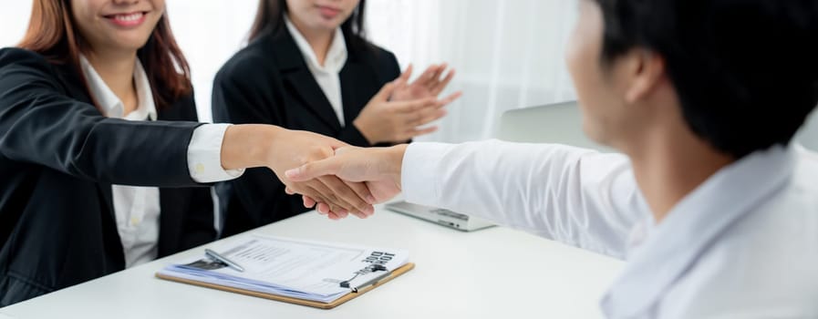 Business people group handshake at meeting table. Job interview success or making successful business oratory agreement