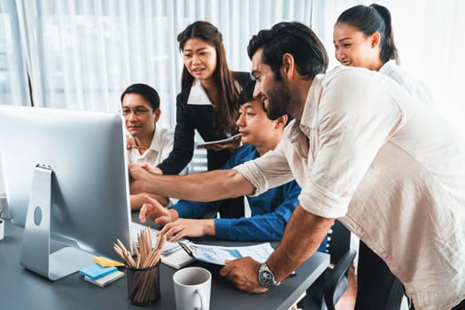 Group of diverse office worker employee working together on strategic business marketing planning in corporate office room. Positive teamwork in business workplace concept. Prudent