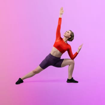 Full body length gaiety shot athletic and sporty woman doing healthy and meditative yoga exercise workout posture on isolated background. Healthy active and body care lifestyle