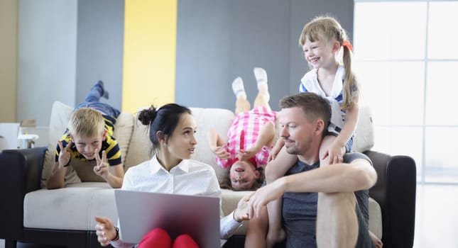 Portrait of family spend time together, father mother and kids chatting, quality time on weekend. Family, childhood, parenthood, leisure, pastime concept