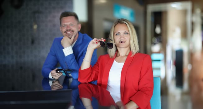 Portrait of businesspeople in luxury suits, colleagues wait for rest of team, meet for business discussion in cafe. Negotiation, contract, strategy concept