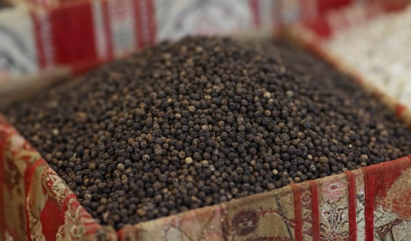 Close-up of bunch of black pepper, tiny round food ingredient, spice, seasoning, taste. Peppercorn, cooking ingredients, flavor, pepper grains concept