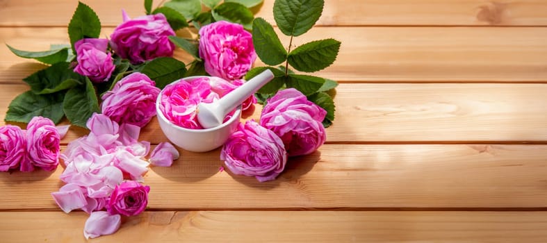 rose essential oil, pink rose SPA and aromatherapy. Selective focus.