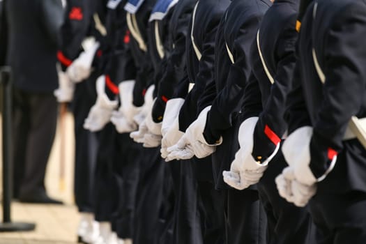 French sailors in white gloves in rank on a parade of 8 may