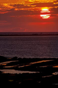 Fantastic sunset on the beach of Cortadura on Cadiz, Spain