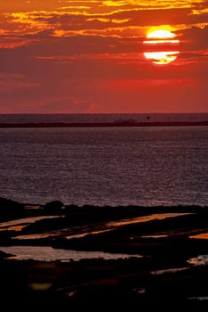 Fantastic sunset on the beach of Cortadura on Cadiz, Spain