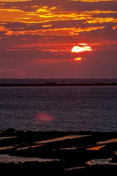 Fantastic sunset on the beach of Cortadura on Cadiz, Spain