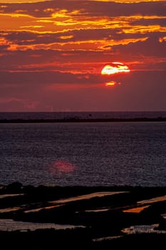 Fantastic sunset on the beach of Cortadura on Cadiz, Spain