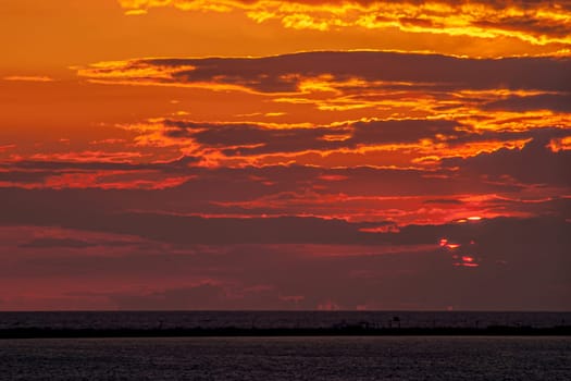 Fantastic sunset on the beach of Cortadura on Cadiz, Spain