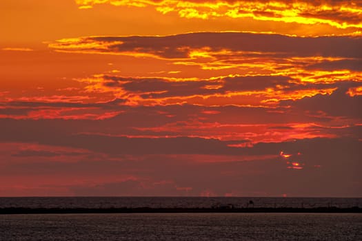 Fantastic sunset on the beach of Cortadura on Cadiz, Spain