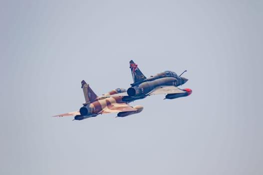 TORRE DEL MAR, MALAGA, SPAIN-JUL 28: Aircraft Mirage 2000 of the Couteau Delta Tactical Display  taking part in a exhibition on the 2nd airshow of Torre del Mar on July 28, 2017, in Torre del Mar, Malaga, Spain