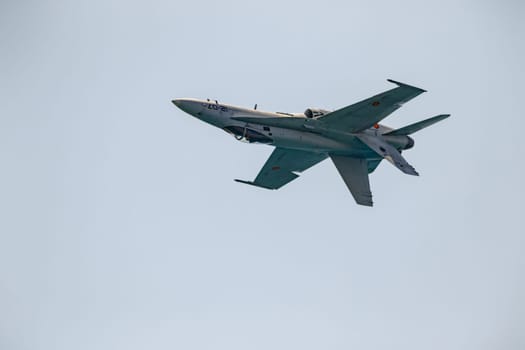 TORRE DEL MAR, MALAGA, SPAIN-JUL 30: Aircraft F-18 Hornet taking part in a exhibition on the 2nd airshow of Torre del Mar on July 30, 2017, in Torre del Mar, Malaga, Spain