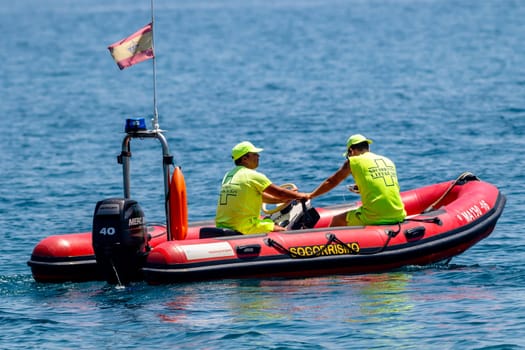 TORRE DEL MAR, MALAGA, SPAIN-JUL 28: Spanish coast guard taking part in a exhibition on the 2nd airshow of Torre del Mar on July 28, 2017, in Torre del Mar, Malaga, Spain