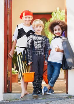 Children, halloween and celebration in costume or portrait in front yard, holiday and spooky outfit or tradition. Kids, face and role play with basket, fancy dress and happiness in garden of home.