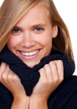 Happy, portrait and woman with winter fashion in studio with cool, trendy and comfortable outfit. Face, smile and female model with texture satisfaction from cosy, style or casual clothing choice.