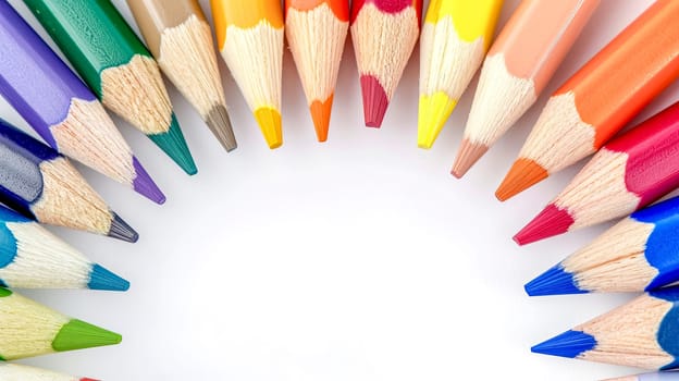 semicircle of sharpened colored pencils with tips pointing inward, displaying a spectrum of colors against a bright white background, symbolizing creativity and artistic potential, copy space
