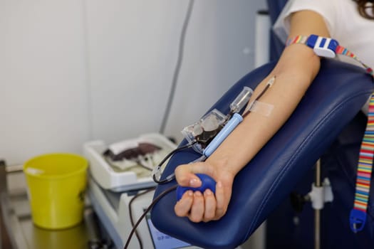 blood donor, gives blood in the laboratory. High quality photo