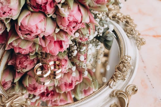 bridal bouquet mirror and rings. High quality photo