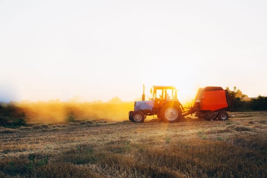 a machine that makes hay in a circle. High quality photo