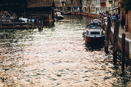 Venice narrow canal gondolas and boats. High quality photo