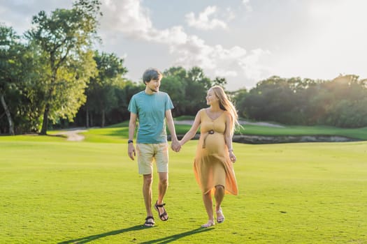 A blissful moment as a pregnant woman and her husband spend quality time together outdoors, savoring each other's company and enjoying the serenity of nature.