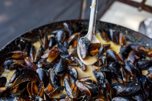 mussels are cooked on the street. High quality photo