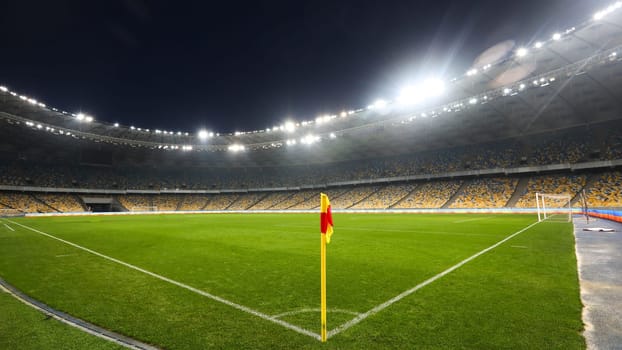 CORNER FLAG ON THE FOOTBALL FIELD , large stadium. High quality photo