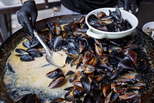 mussels are cooked on the street. High quality photo