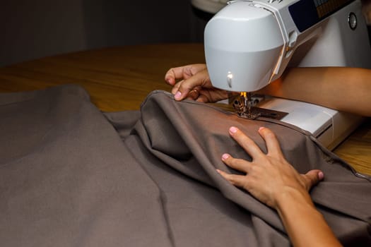 sewing machine, seamstress hand fabric. High quality photo