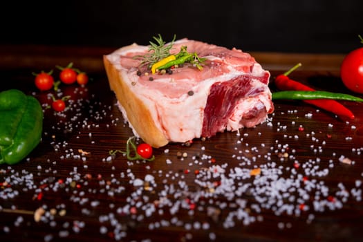 Raw rib eye beef steak on a black background. High quality photo