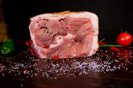 Raw rib eye beef steak on a black background. High quality photo