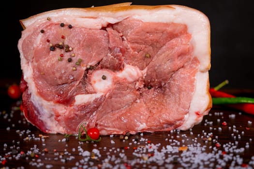 Raw rib eye beef steak on a black background. High quality photo