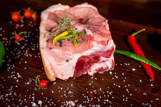 Raw rib eye beef steak on a black background. High quality photo