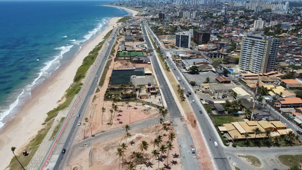 salvador, bahia, brazil - november 20, 2024: workers working on the Atlantic coast of the city of Salvador.