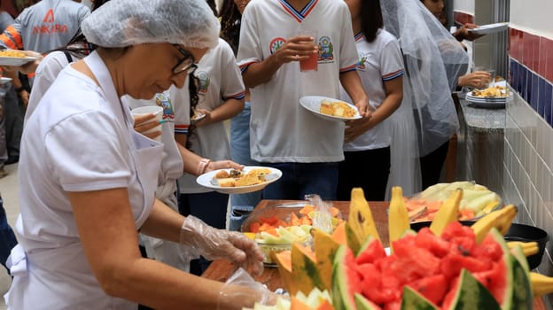 euclides da cunha, bahia, brazil - setembro 18, 2023: students from a public school having a meal at the teaching unit